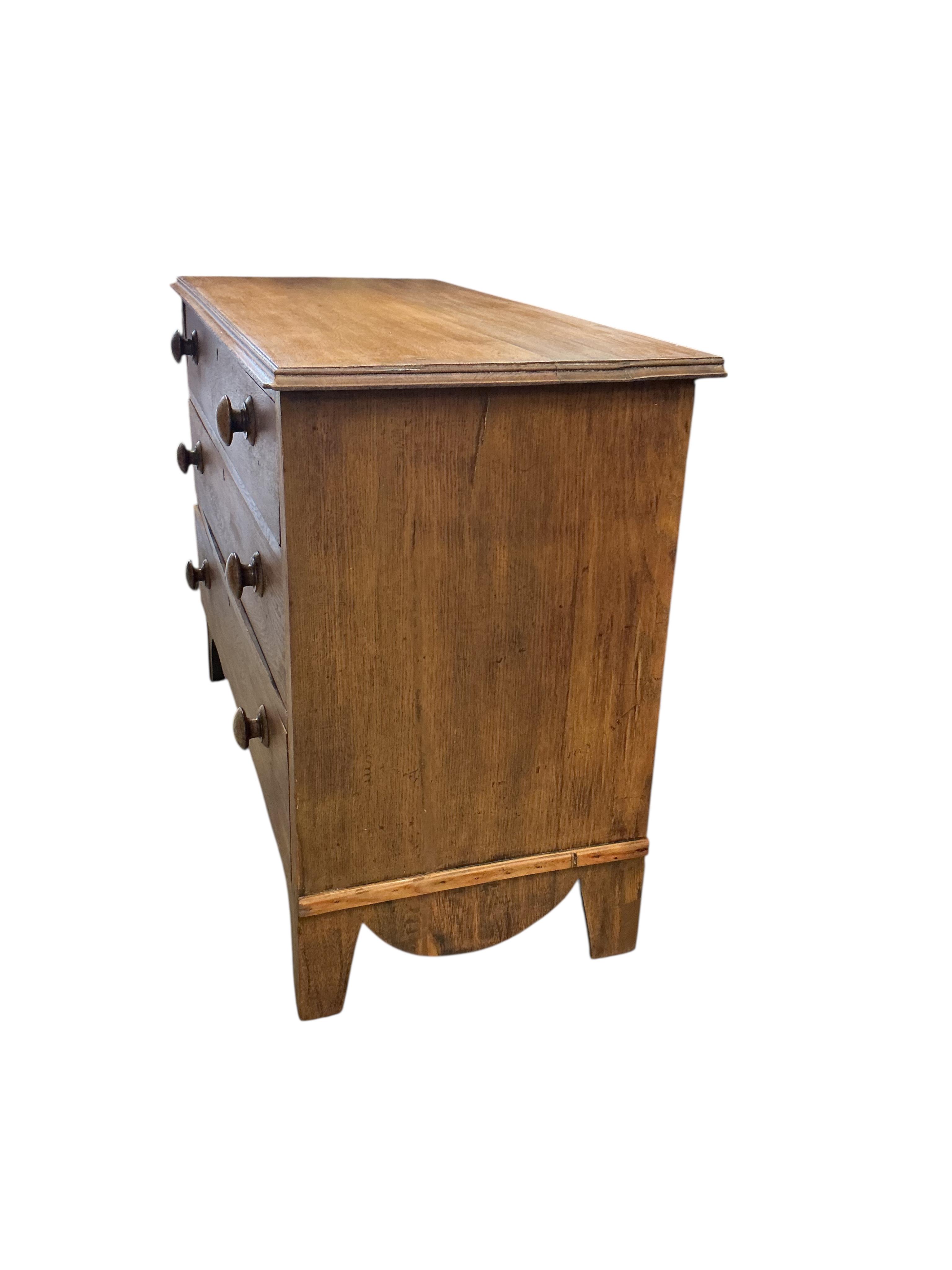 An early 20th century oak three drawer chest, width 106cm, depth 49cm, height 78cm
